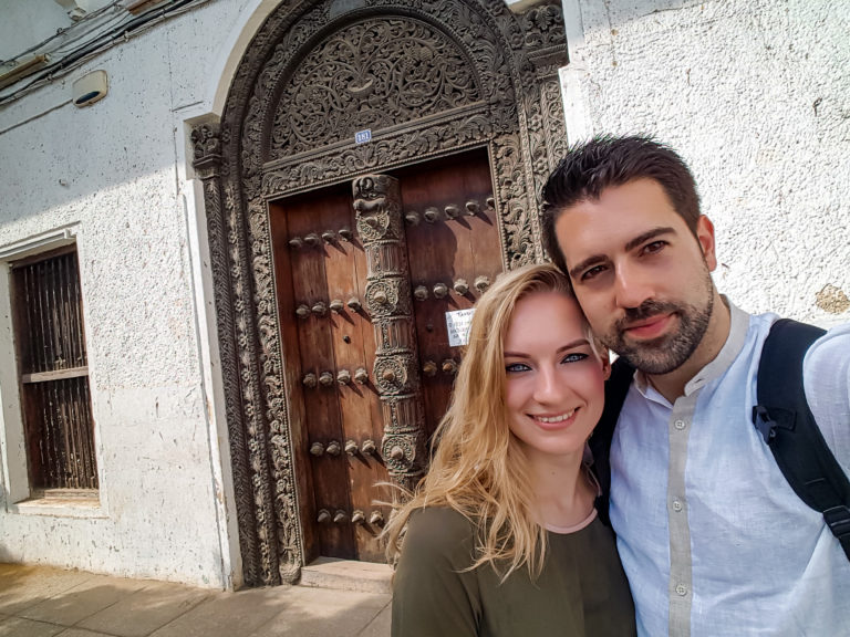 Selfie in front of a typical wooden door in Stone Town - Zanzibar - Africa