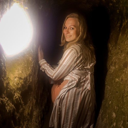 Crawling through Derinkuyu underground city in Cappadocia. Part of the Green Tour.