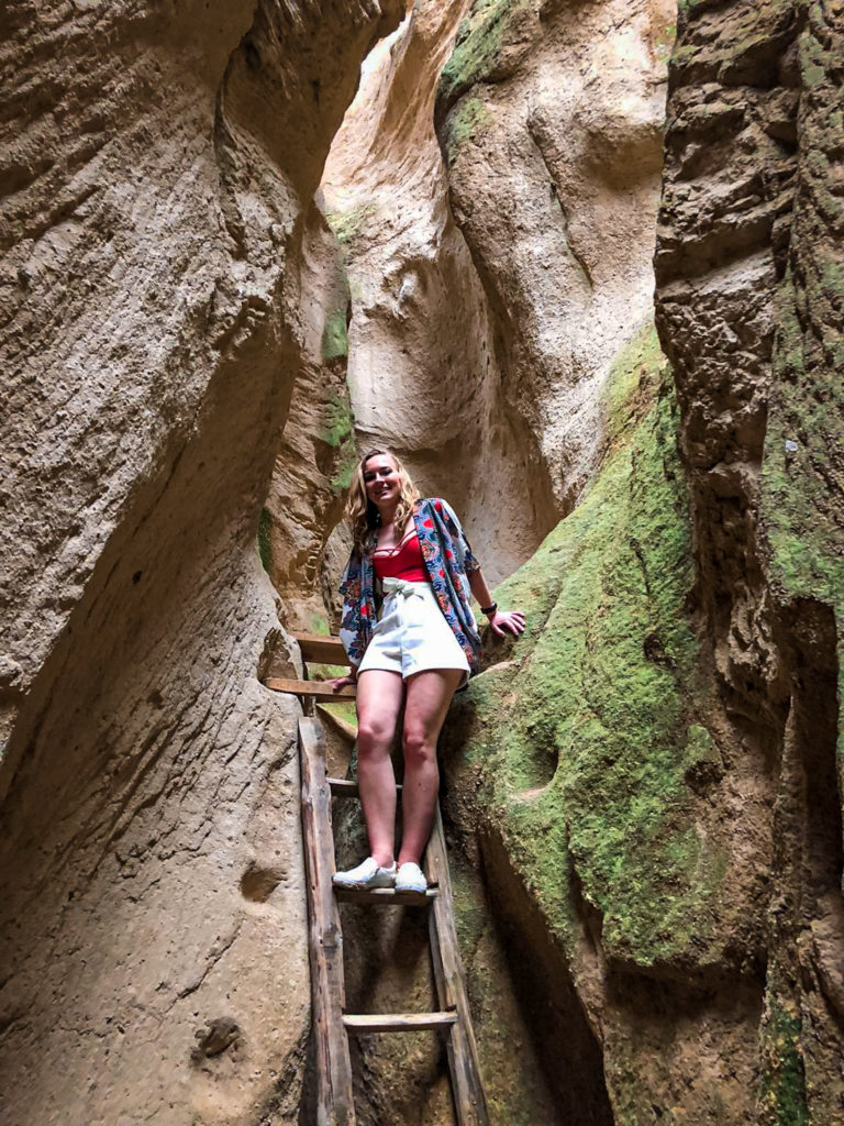 Climbing the wooden stairs in the Goreme Canyon in Cappadocia