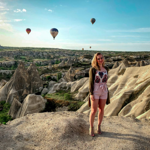 Watching the hot air balloon sunrise from Goreme viewpoint in Cappadocia