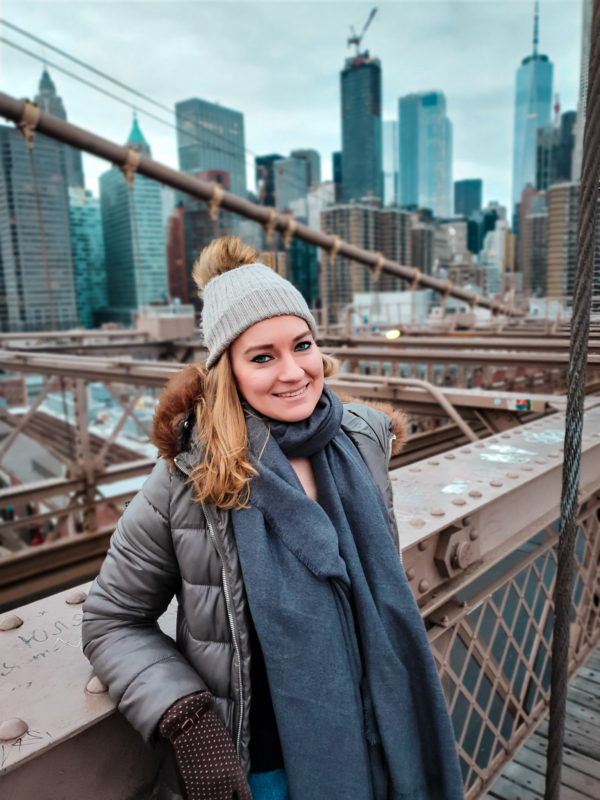 Portrait from Brooklyn Bridge with New York City in the background