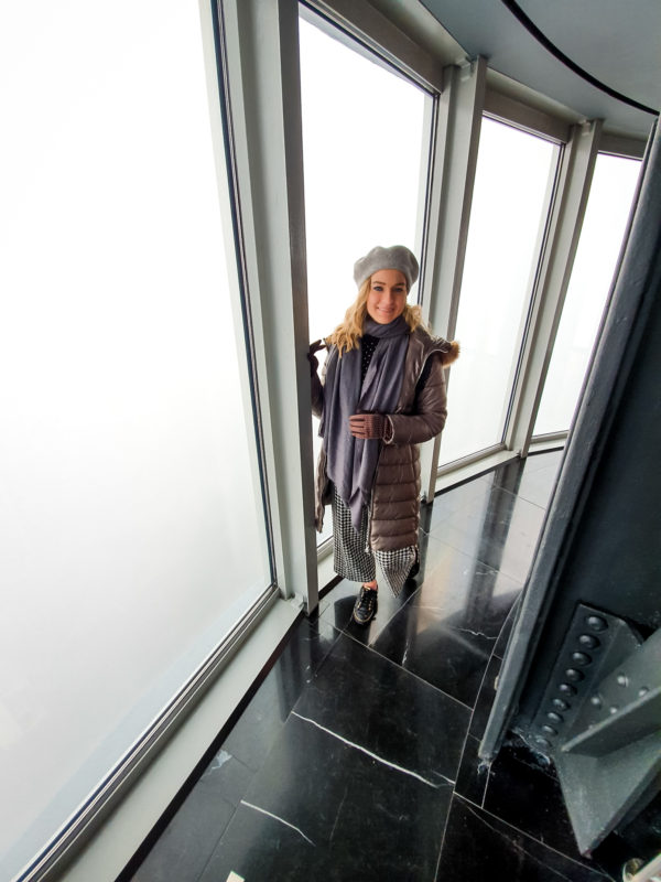 Views from the 102nd floor observatory deck of the Empire State Building on a cloudy day