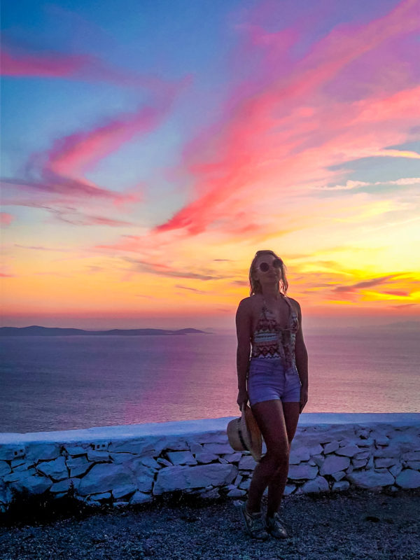 Amazing sunset colours in the sky at Armenistis Lighthouse in Mykonos - Greece
