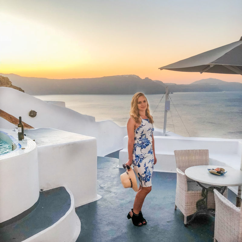 Breakfast table at sunrise with sea views at the Honeymoon Suite (Prime Suites) in Oia, Santorini, Greece