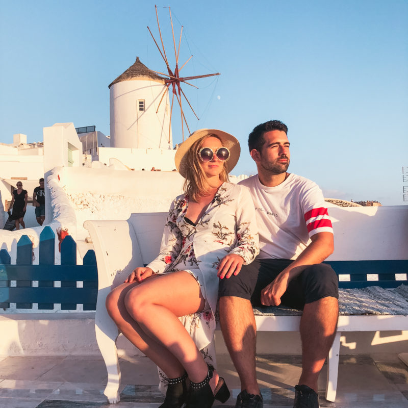 Watching the sunset at Glitzy Windmill in Oia (Santorini - Greece)