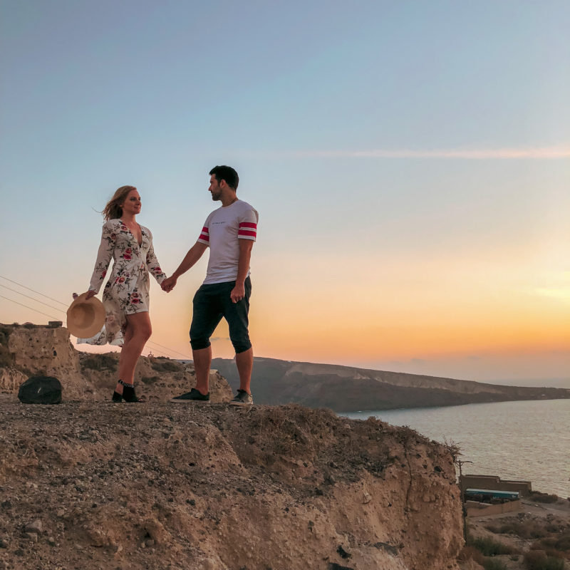Watching the sunset from the cliff near OYA and Ammoudi beaches in Santorini