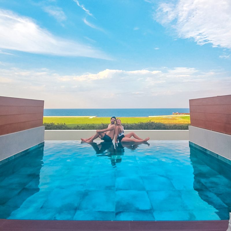 Couple in private infinity pool of Honeymoon Suite at Lesante Blu resort in Zakynthos, Greece