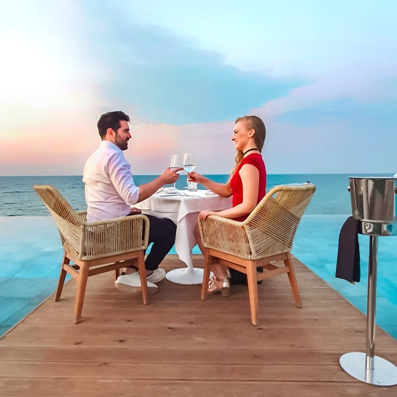 Sunset dinner inside the infinity pool of Melia Fine Dining restaurant in Lesante Blu resort in Zakynthos, Greece