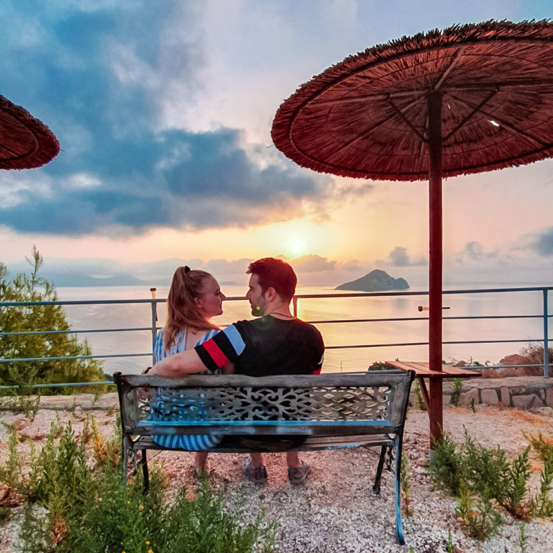 Couple watching the sunrise at Athenea Villas in Zakynthos, Greece