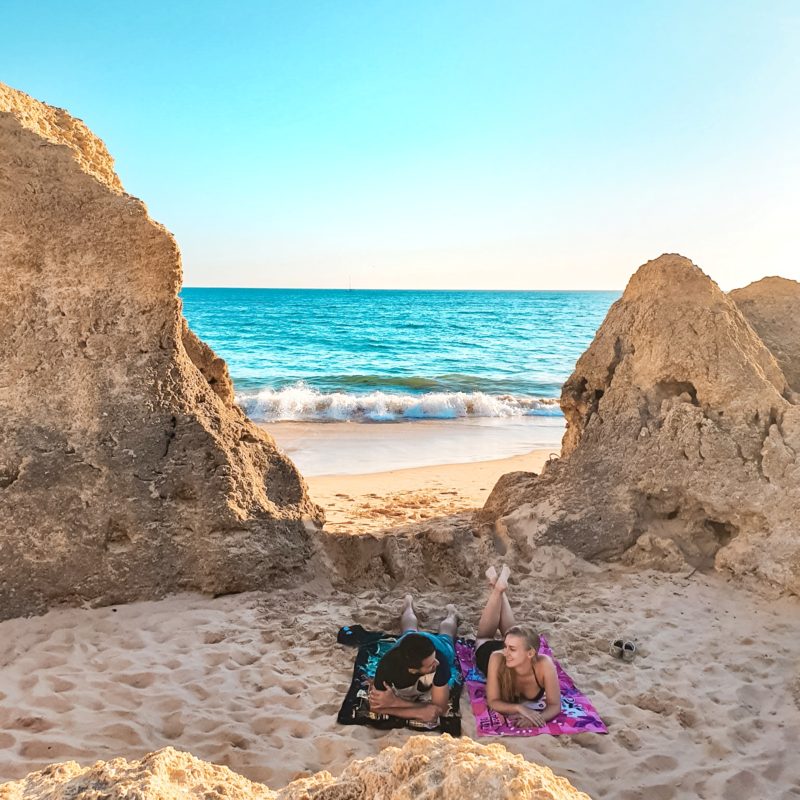 Couple posing at Praia da Gale in Algarve, Portugal
