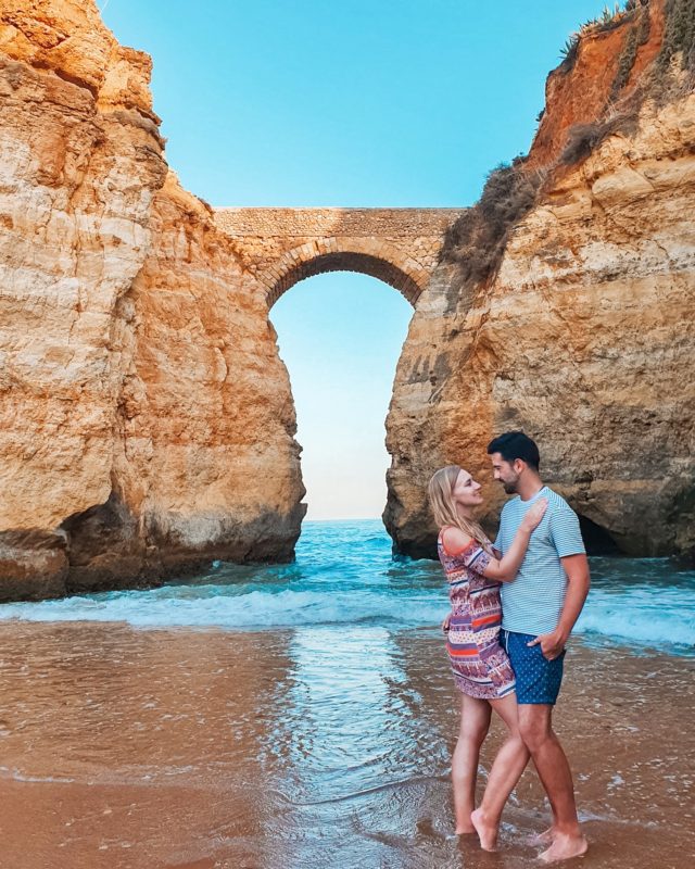 Couple posing at Praia dos Estudantes in Algarve, Portugal