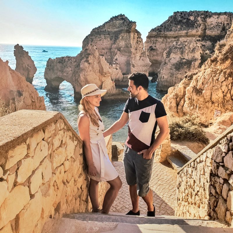 Couple posing at Ponta da Piedade in Algarve, Portugal