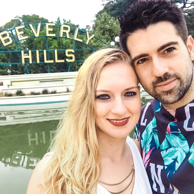 Selfie of Couple in front of Beverly Hills sign, Los Angeles, California, USA