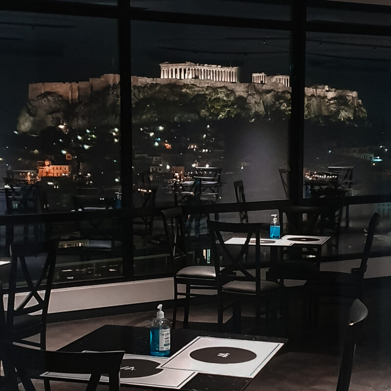 Acropolis views at night from breakfast room in Astor Hotel in Athens, Greece