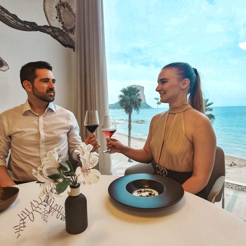 Couple having romantic dinner at Abiss restaurant in Calpe, Costa Blanca, Spain
