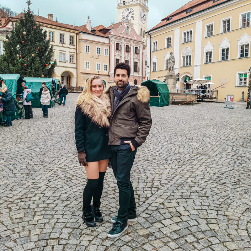 Couple posing at Christmas market in Mikulov