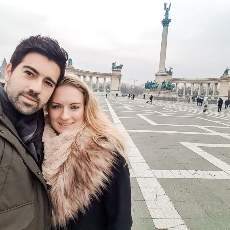 Selfie of a travel couple in front of Heroes Square in Budapest, Hungary