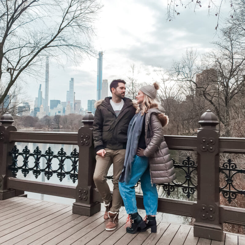 Travel couple enjoying a romantic walk in Central Park, New York City