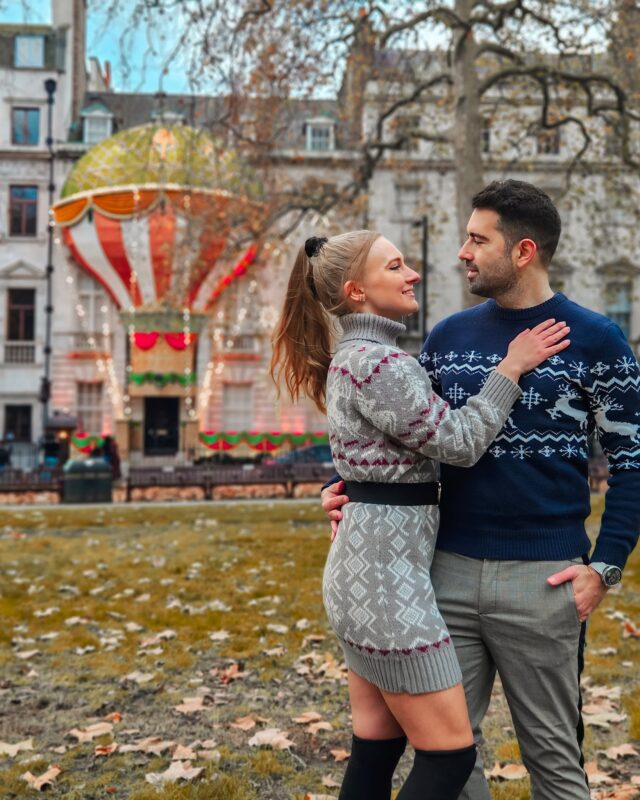 Travel Couple posing with Christmas Decorations at Annabel's in Mayfair London