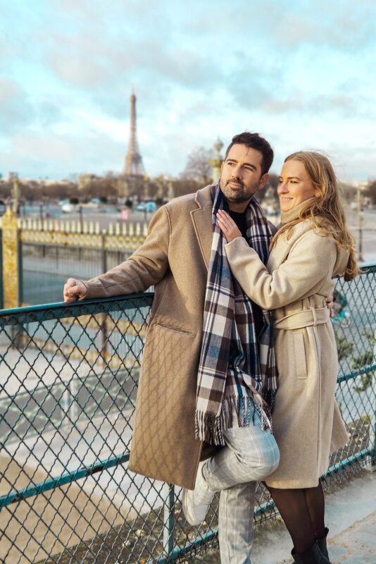 Romantic Photo Spots with Eiffel Tower in Paris - Travel Couple posing with Eiffel Tower at Tuileries Garden