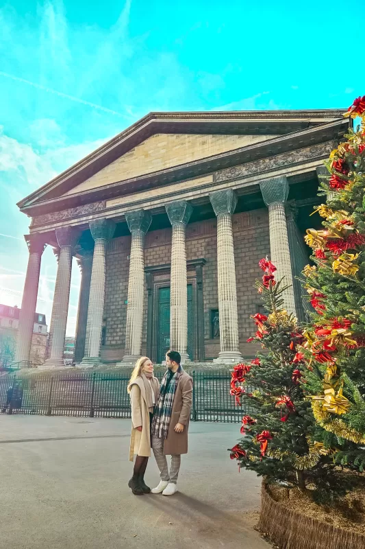 Romantic Photo Spots in Paris for Couples - Travel Couple posing in front of La Madeleine