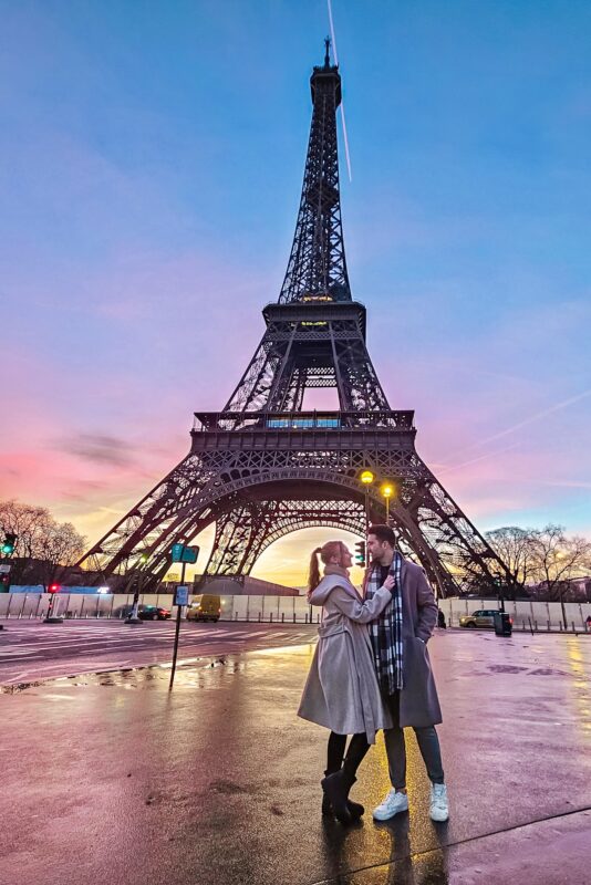Romantic Photo Spots with Eiffel Tower in Paris - Travel Couple posing with Eiffel Tower at Jena Bridge (Pont d'Iena)