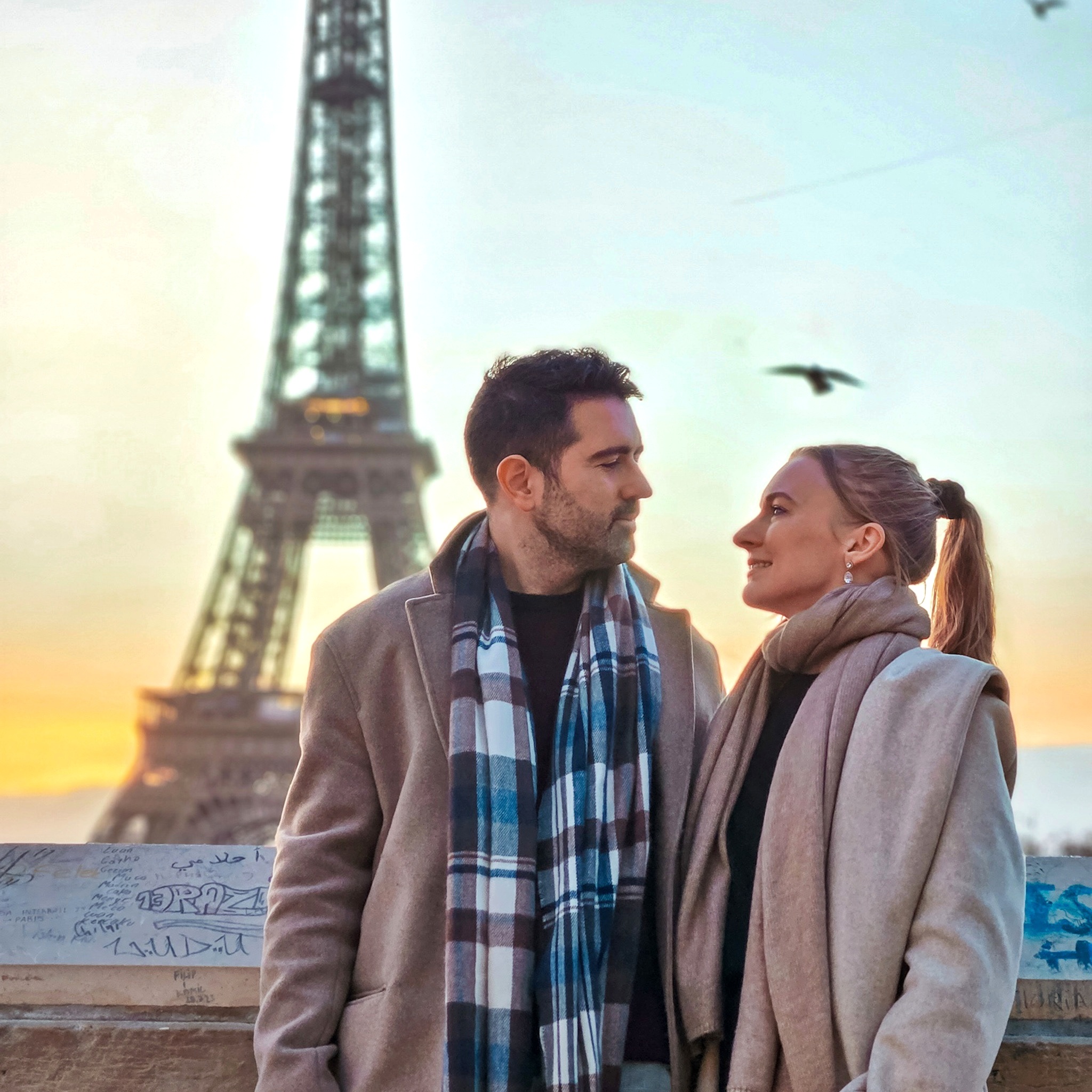 Romantic Photo Spots with Eiffel Tower in Paris - Travel Couple posing with Eiffel Tower at Trocadero stairs