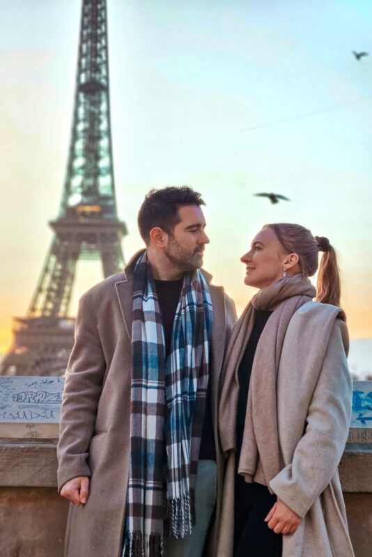 Romantic Photo Spots with Eiffel Tower in Paris - Travel Couple posing with Eiffel Tower at Trocadero Stairs (portrait mode)