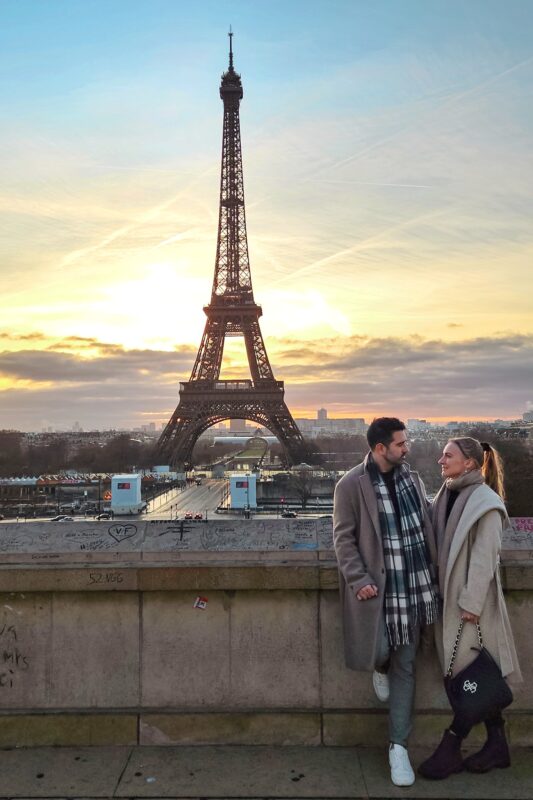 Romantic Photo Spots with Eiffel Tower in Paris - Travel Couple posing with Eiffel Tower at Trocadero Stairs