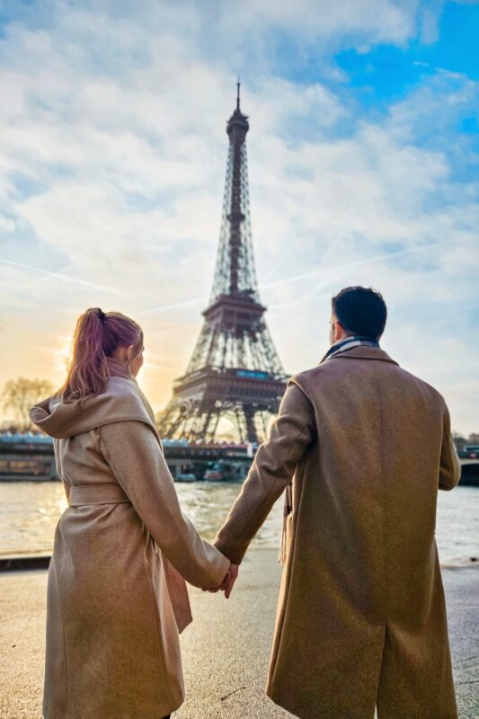 Romantic Photo Spots with Eiffel Tower in Paris - Travel Couple posing with Eiffel Tower at Avenue de New York (portrait mode)