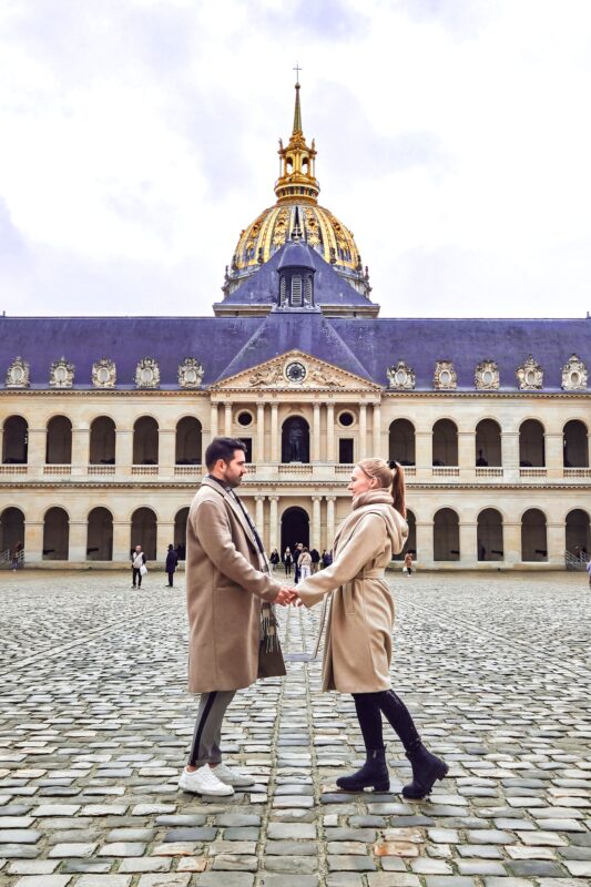 Romantic Photo Spots in Paris for Couples - Travel Couple posing in front of Les Invalides, Army Museum