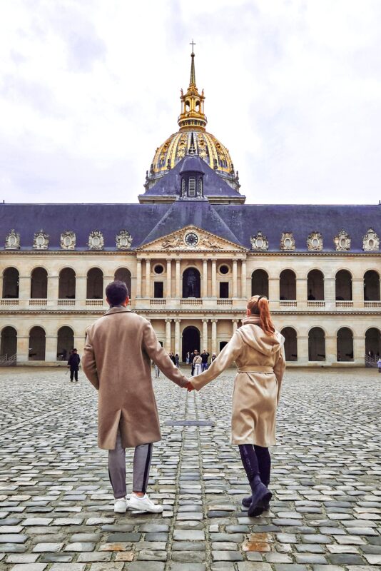 Romantic Photo Spots in Paris for Couples - Travel Couple posing in front of Les Invalides, Army Museum