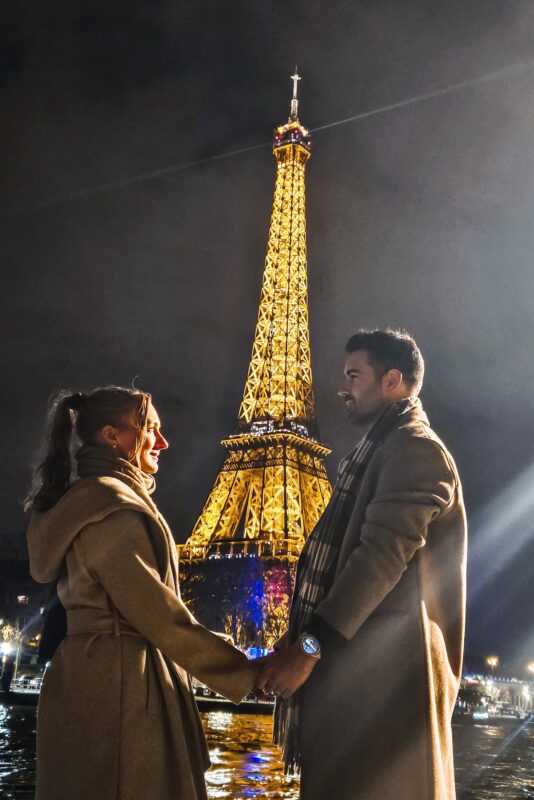 Romantic Photo Spots with Eiffel Tower in Paris - Travel Couple posing with Eiffel Tower at Avenue de New York at night