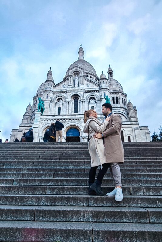 Romantic Photo Spots in Paris for Couples - Travel Couple Posing in front of the Sacre Coeur