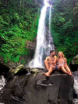 Bathing underneath the Gitgit waterfall in Bali