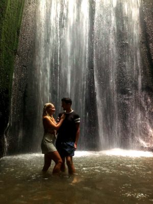 Underneath the Tukad Cepung waterfall